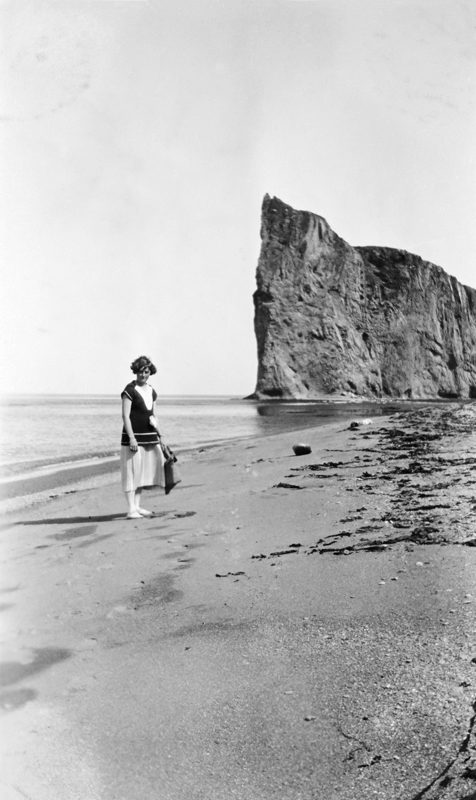 <i>“On the way to the rock”: Pauline Christin at Percé Rock, Percé, Quebec</i>, 1925. Gift of the Cardaillac family, M2001.8.33.157, McCord Museum