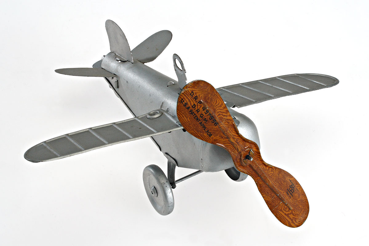<i>Toy airplane, Bing Co.</i>, 1924-1932. Gift of Sylvain Pilon, M2008.117.4.1 © McCord Museum