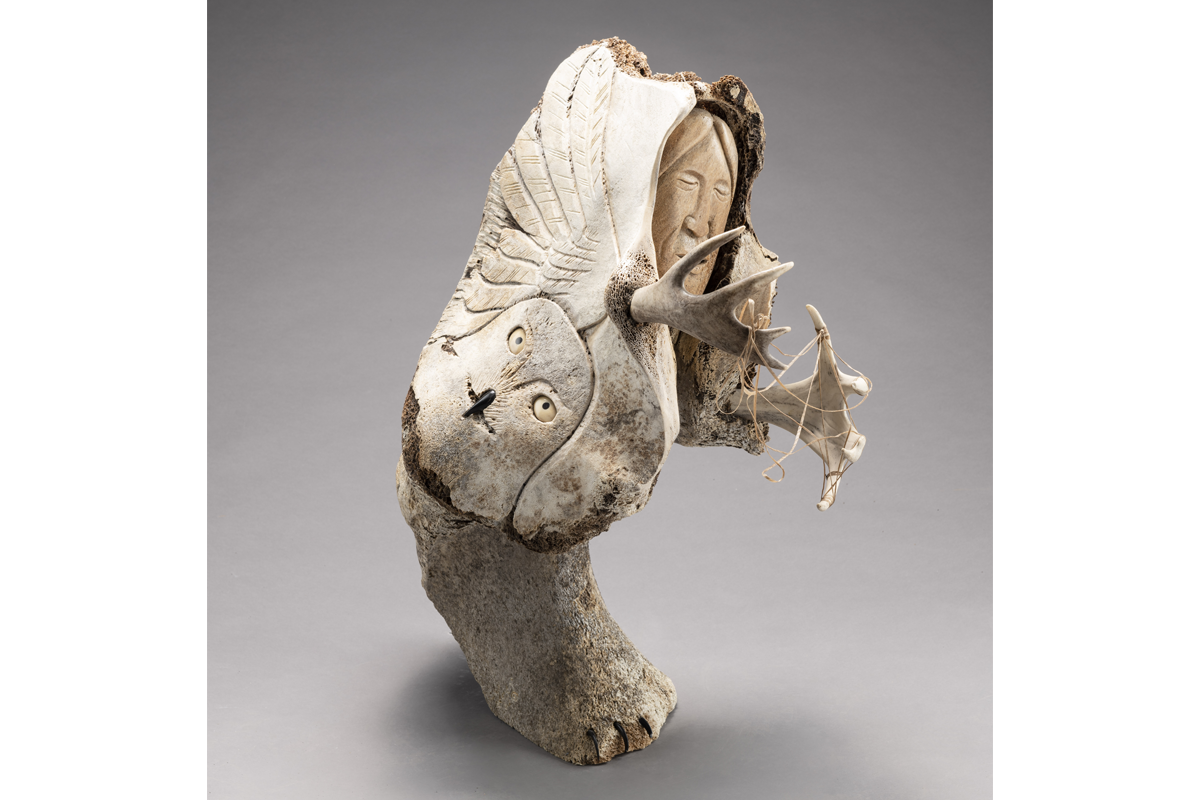 Manasie Akpaliapik, <em>A Woman Storyteller</em>, 2003. Whalebone, sinew, caribou antler, baleen, white stone and black African wonderstone, 65 x 37 x 61,2 cm. MNBAQ, promised gift of Lyse Burgoyne-Brousseau (DPD.2016.19) © Manasie Akpaliapik Photo: MNBAQ, Idra Labrie